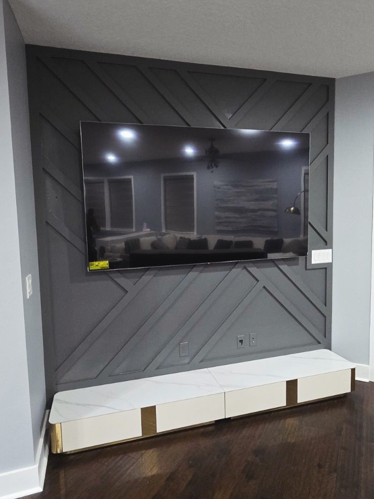 Floating-shelf TV built-in with shaker cabinets by AVP Construction JAX — Jacksonville & St. John's County, FL